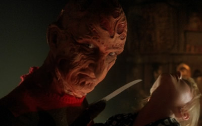 Robert Englund as Freddy Krueger in A Nightmare on Elm Street: The Dream Child