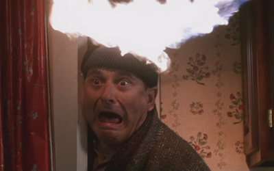 Joe Pesci as Harry in Home Alone (1990) Joe Pesci as Harry in Home Alone (1990)