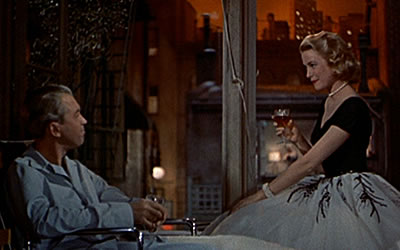 James Stewart and Grace Kelly in Rear Window (1954) James Stewart and Grace Kelly in Rear Window (1954)