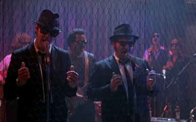 Dan Aykroyd and John Belushi in The Blues Brothers (1980) Dan Aykroyd and John Belushi in The Blues Brothers (1980)