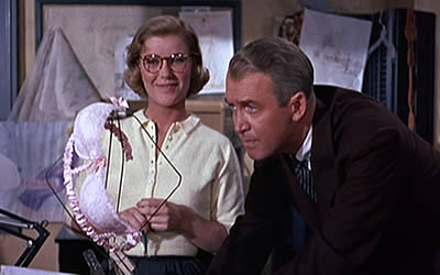 Barbara Bel Geddes and James Stewart in Vertigo Barbara Bel Geddes and James Stewart in Vertigo