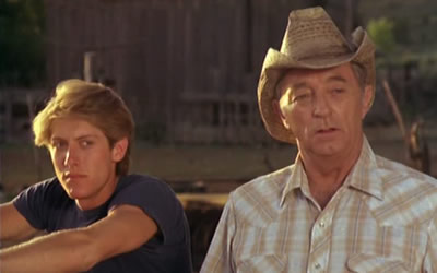 James Spader and Robert Mitchum in A Killer in the Family (1983)