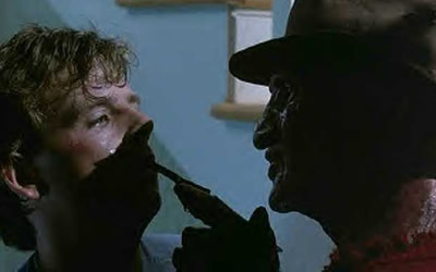 Mark Patton and Robert Englund in A Nightmare on Elm Street Part 2