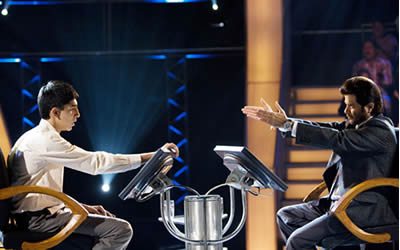 Dev Patel and Anil Kapoor in Slumdog Millionaire Dev Patel and Anil Kapoor in Slumdog Millionaire