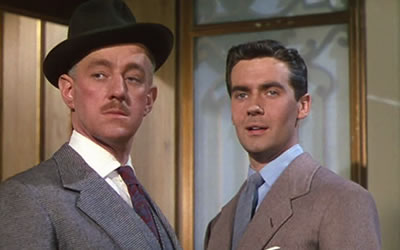 Alec Guinness and Vernon Gray in To Paris with Love (1955)